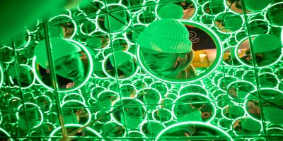 Green Bubble_WOI Green Bubbled illusion wall with head in the gap.